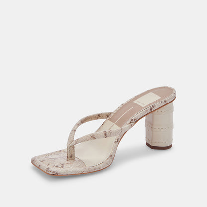 RHYE HEELS IN LT TAUPE EMBOSSED STELLA -   Dolce Vita